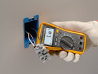 Fluke 117 Digital Multimeter, Non-Contact AC Voltage Detection, Measures Resistance/Continuity/Frequency/Capacitance/Min Max Average, Automatic AC/DC Selection, Low Impedance Mode